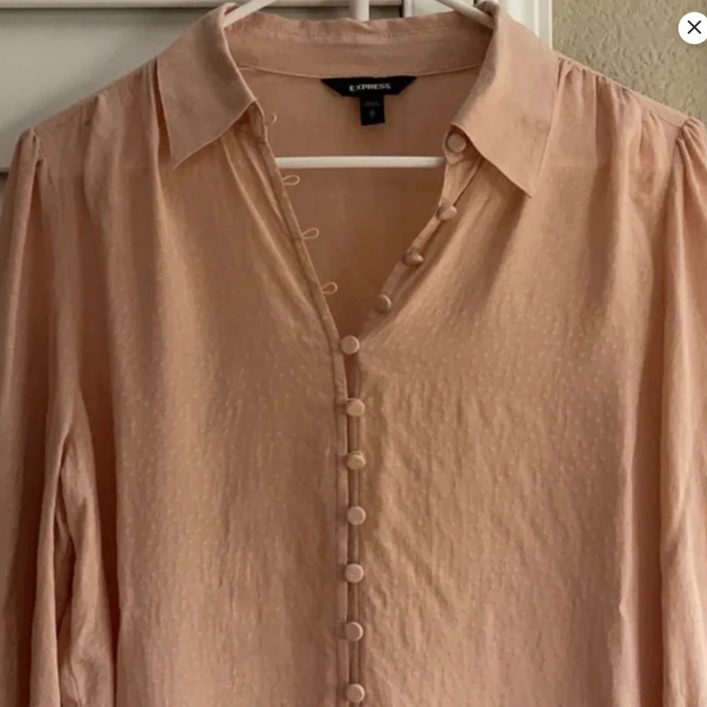 Express women’s long sleeve blouse in size large. New without tags. Pretty soft
